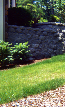 Drainage area showing wall on side of home